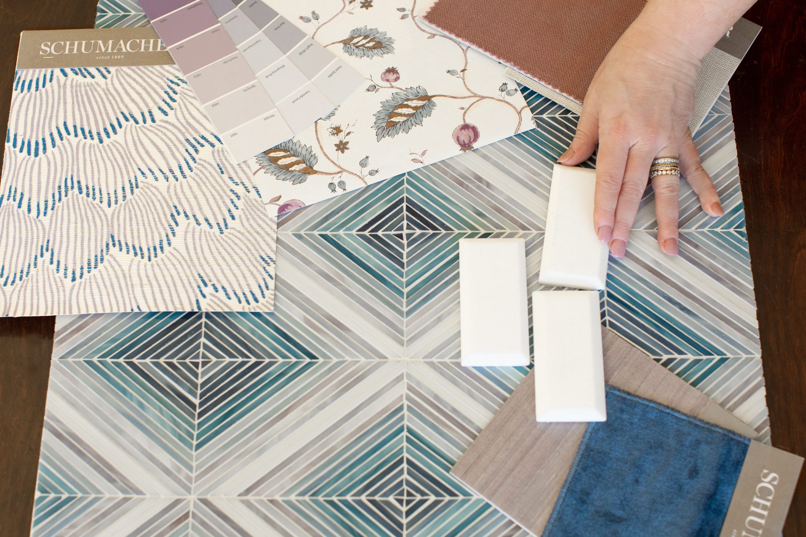 Sarah reviews bold interior design selections of fabric, tile, and paint swatched